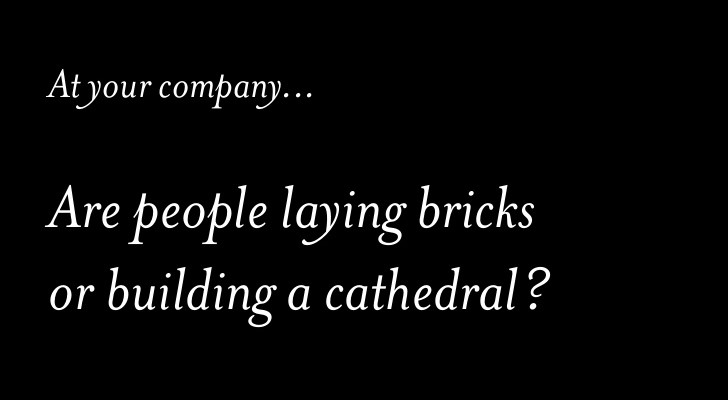Are people laying bricks or building a cathedral